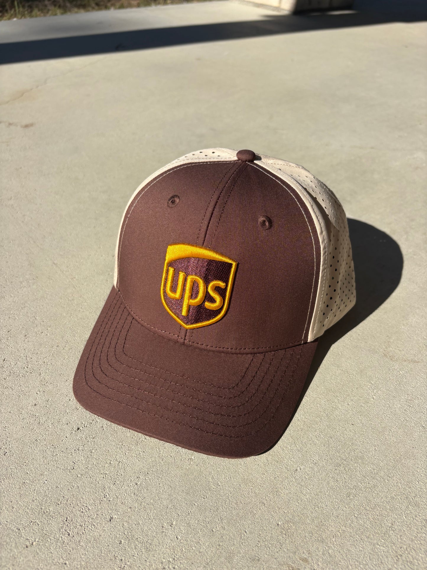 Water resistant UPS hat